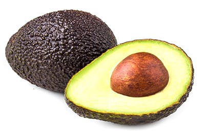 Avocado whole and cut in half